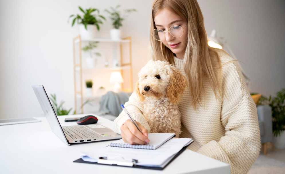 Woman budgeting pet adoption costs at home with her dog