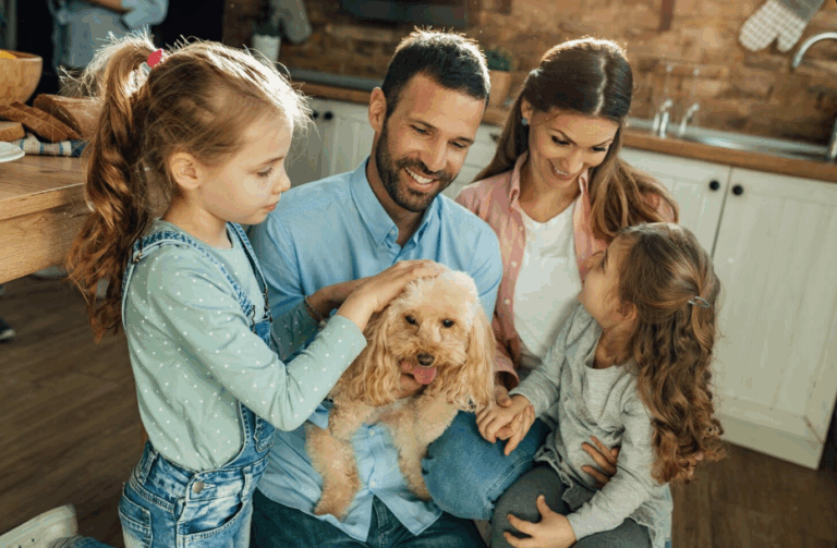 Happy family with a foster dog as part of foster-to-adopt programs